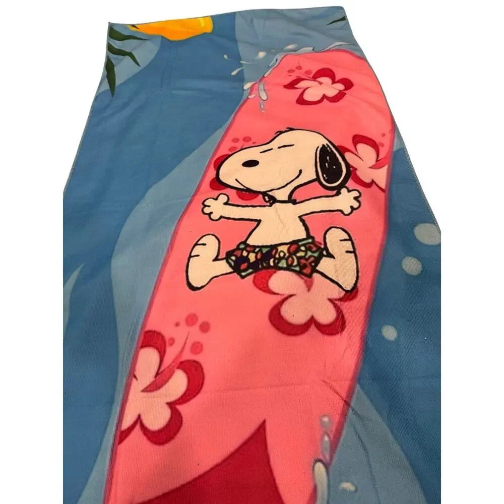 Snoopy on a surfboard beach towel